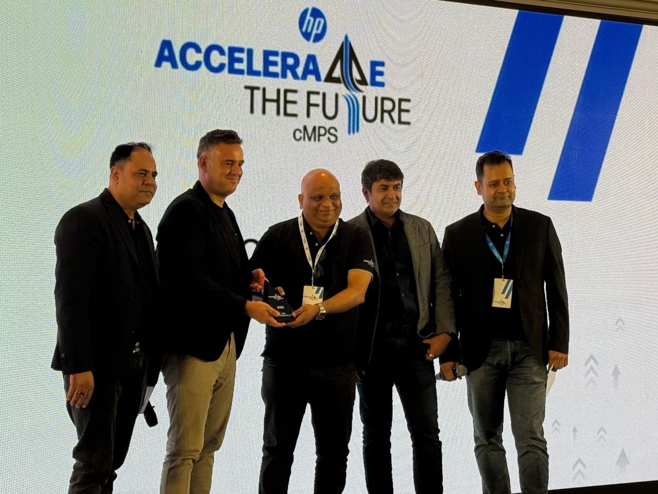 SNA Infotech receiving recognition at the HP Accelerate the Future cMPS partner event on 2025